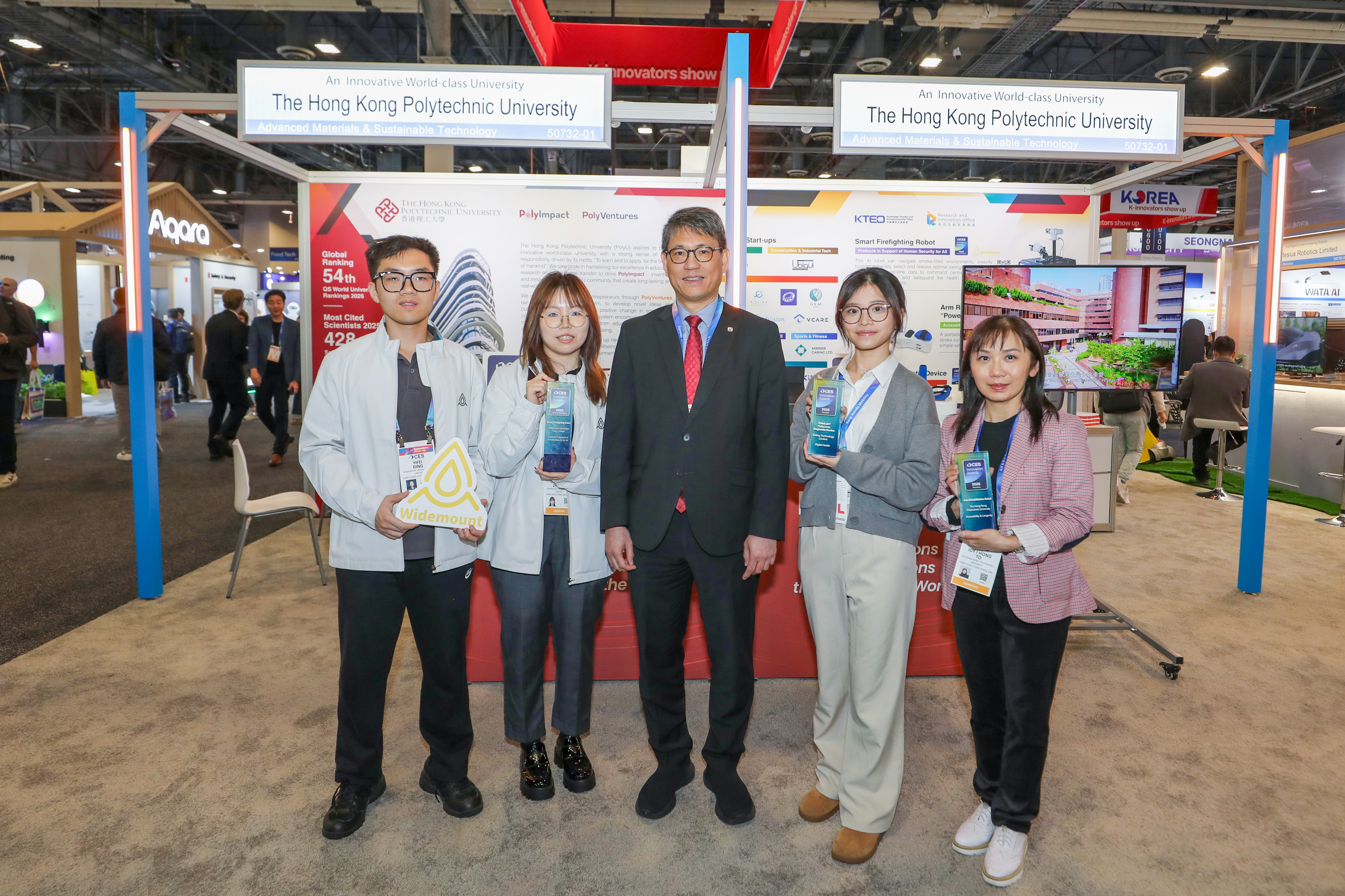 PolyU led 19 startups to exhibit at CES 2026. Prof. Christopher Chao (centre) posed with representatives from the award-winning PolyU teams.